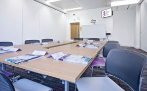 viewa across the desks in the breakout room