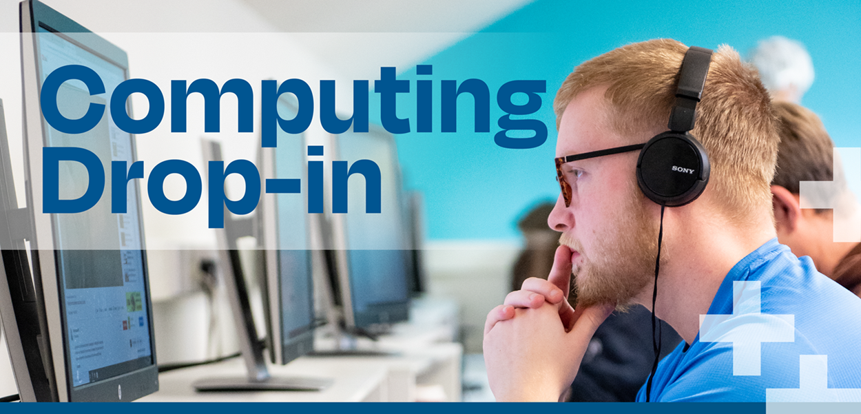 A side view image of a male student sitting at a computer desk, he is wearing dark rimmed glasses and has light, short cropped hair. The words A side view image of a male student sitting at a computer desk, he is wearing dark rimmed glasses and has light, short cropped hair. The words
