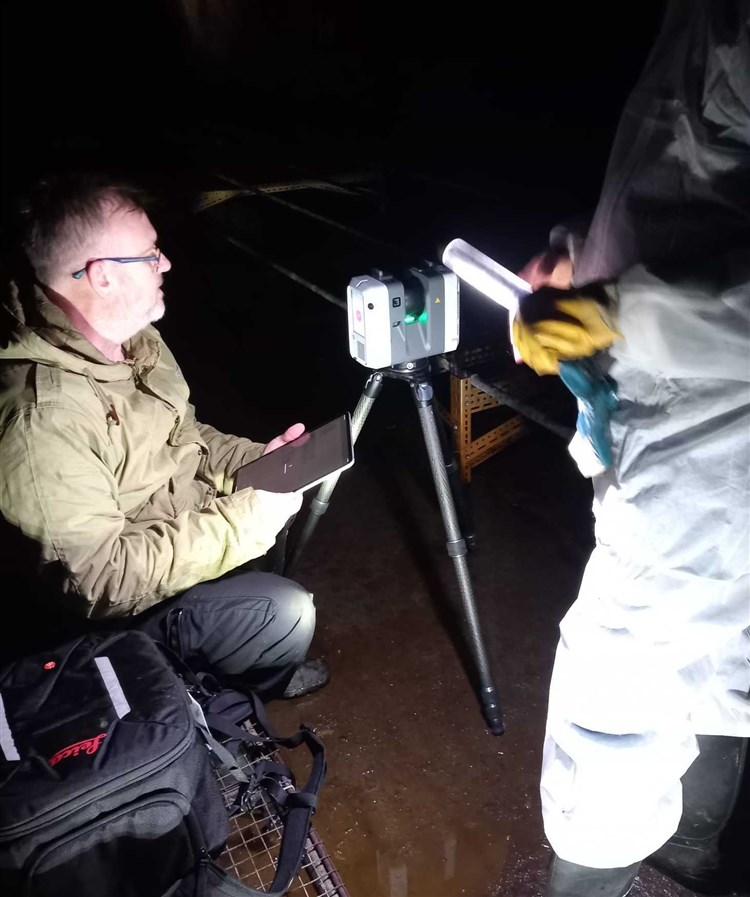 Dr Malcolm Clark performing a LIDAR scan