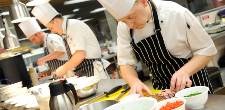 Three lecturer chefs working in our training restaurant