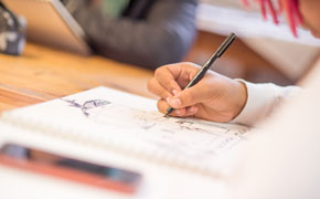 Close up of student drawing
