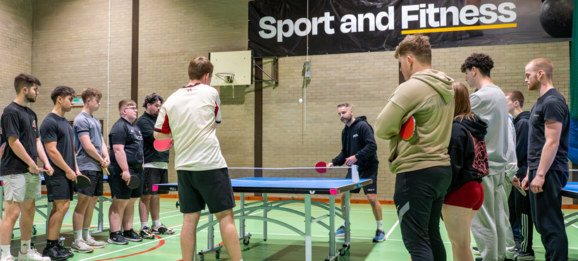 students playing ping pong students playing ping pong